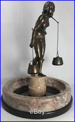 Naked water carrier Art Nouveau sculpture on marble basin