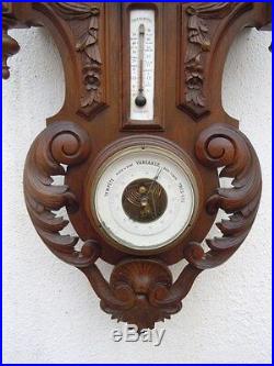 Pendule horloge bois sculpte sculpture foret noire barometre thermometre