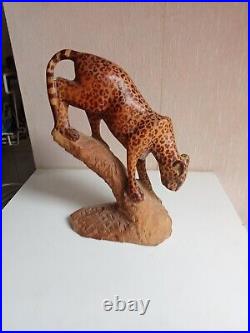 Sculpture en bois art 1920 panthere tacheté sur tronc hauteur 23 cm x 16 cm