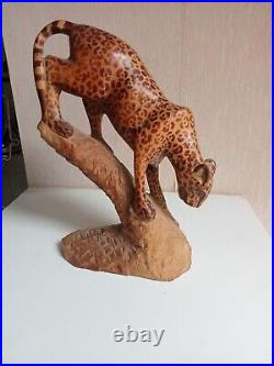 Sculpture en bois art 1920 panthere tacheté sur tronc hauteur 23 cm x 16 cm