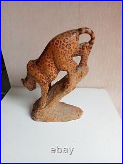 Sculpture en bois art 1920 panthere tacheté sur tronc hauteur 23 cm x 16 cm