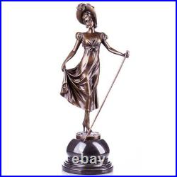 Vintage Figure of a lady with walking stick made of a bronze style Art Nouveau