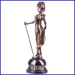 Vintage Figure of a lady with walking stick made of a bronze style Art Nouveau