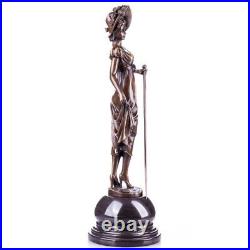 Vintage Figure of a lady with walking stick made of a bronze style Art Nouveau