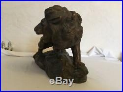 # sculptures statues en terre cuite LION furieux par Foucher patine bronze